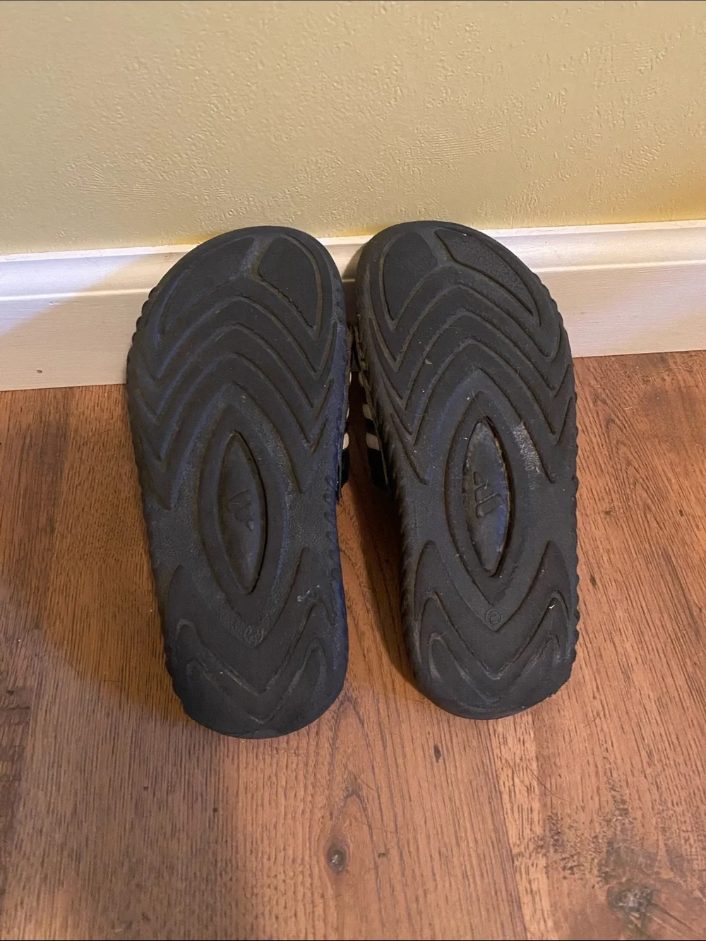 adidas Kids Black Slide Sandals with White Stripes and Blue Accent